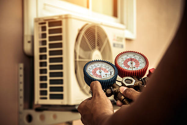 Professional Heat Pump Repair technician working in Scio, OR